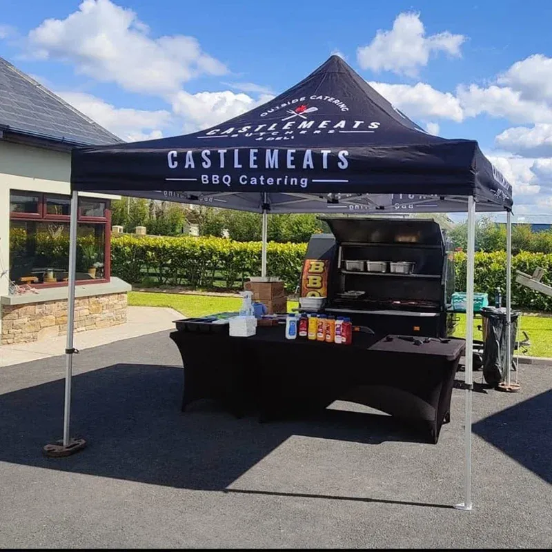 Castlemeats gazebo and BBQ set up on a lawn