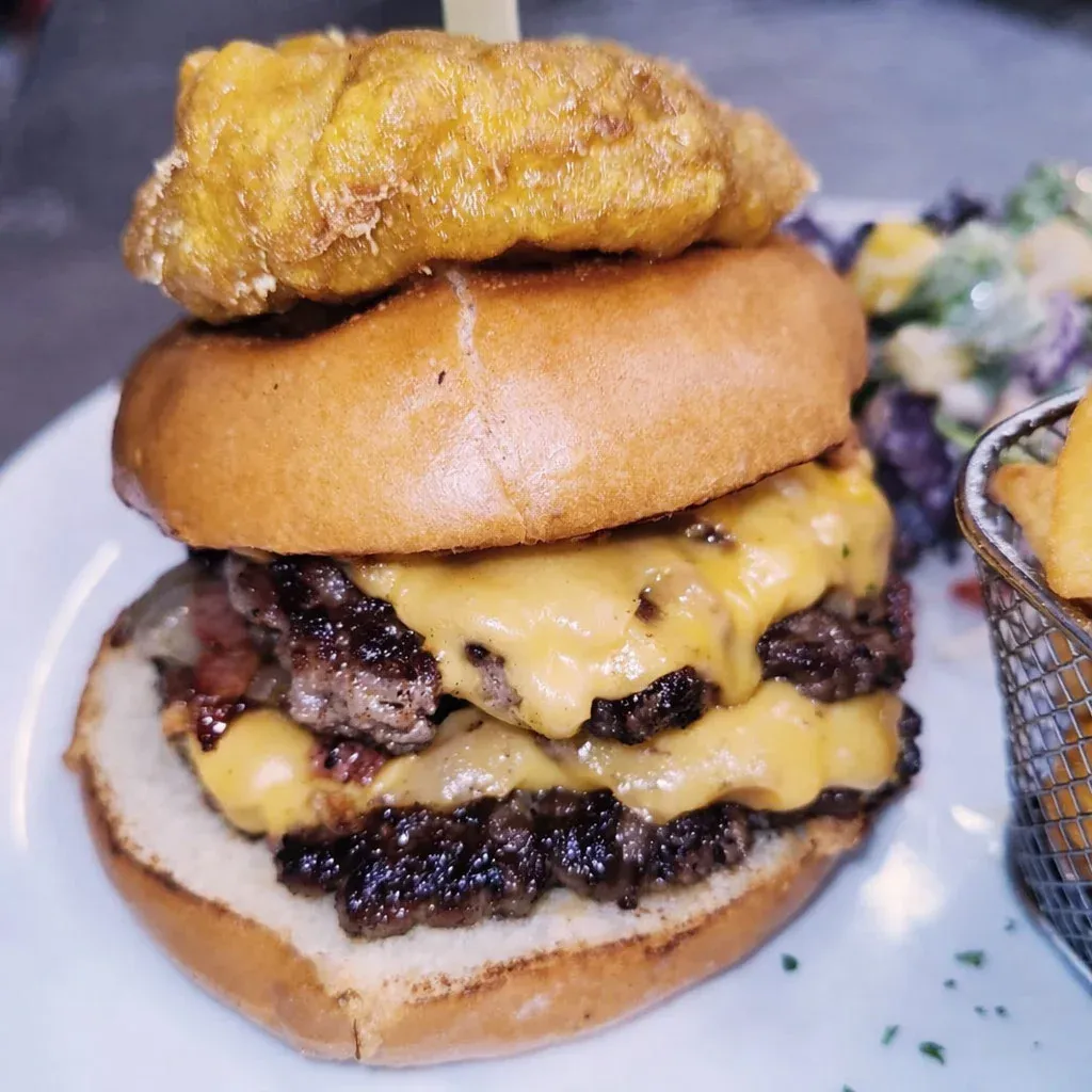 Double cheeseburger on a toasted bun