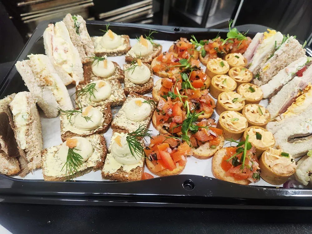 Platter of finger food and sandwiches